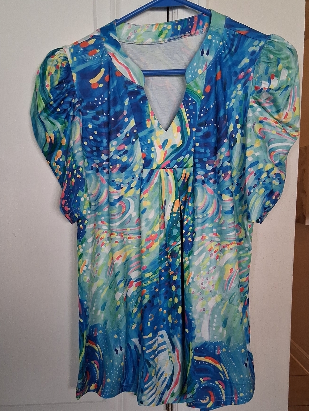 R:  Blue Abstract Print V-Neck Women’s Top